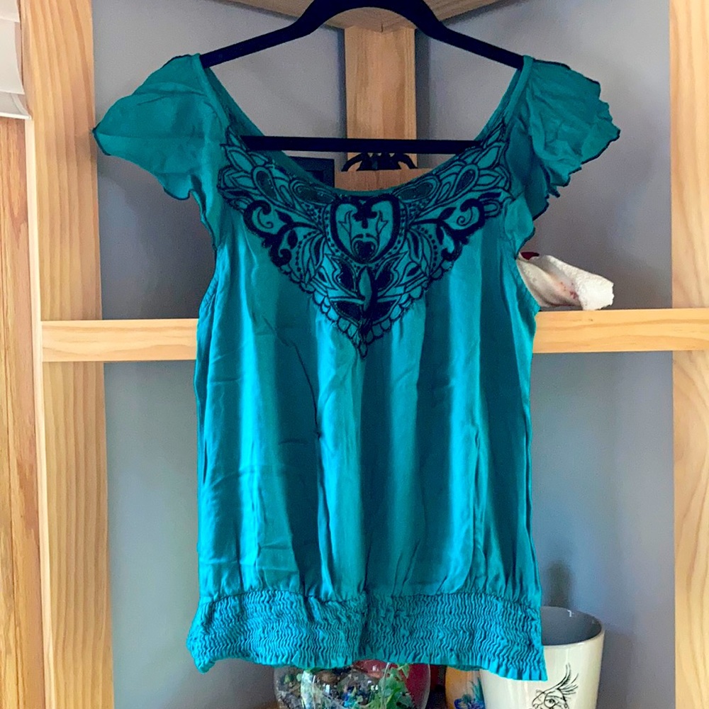 Women’s embroidered ruffle top